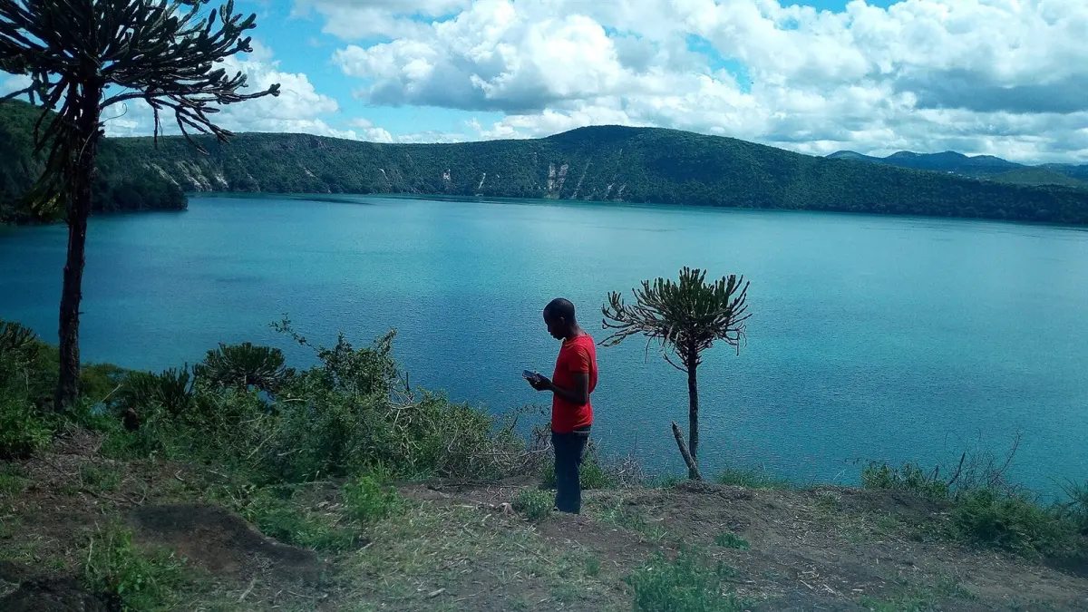 Emerald water of Lake Chala seen from the crater rim